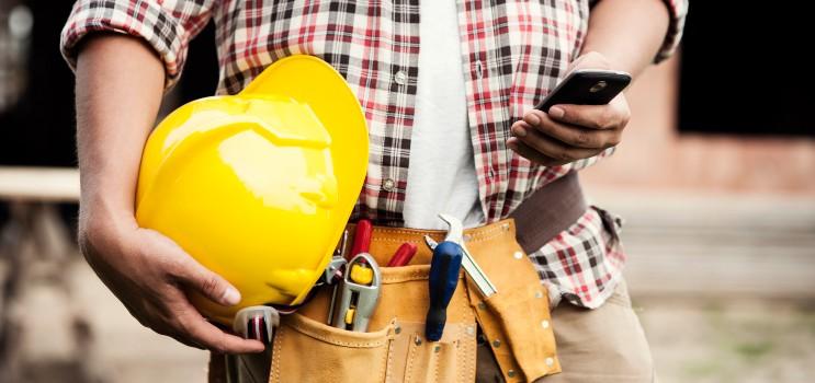 person holding a hard-hat